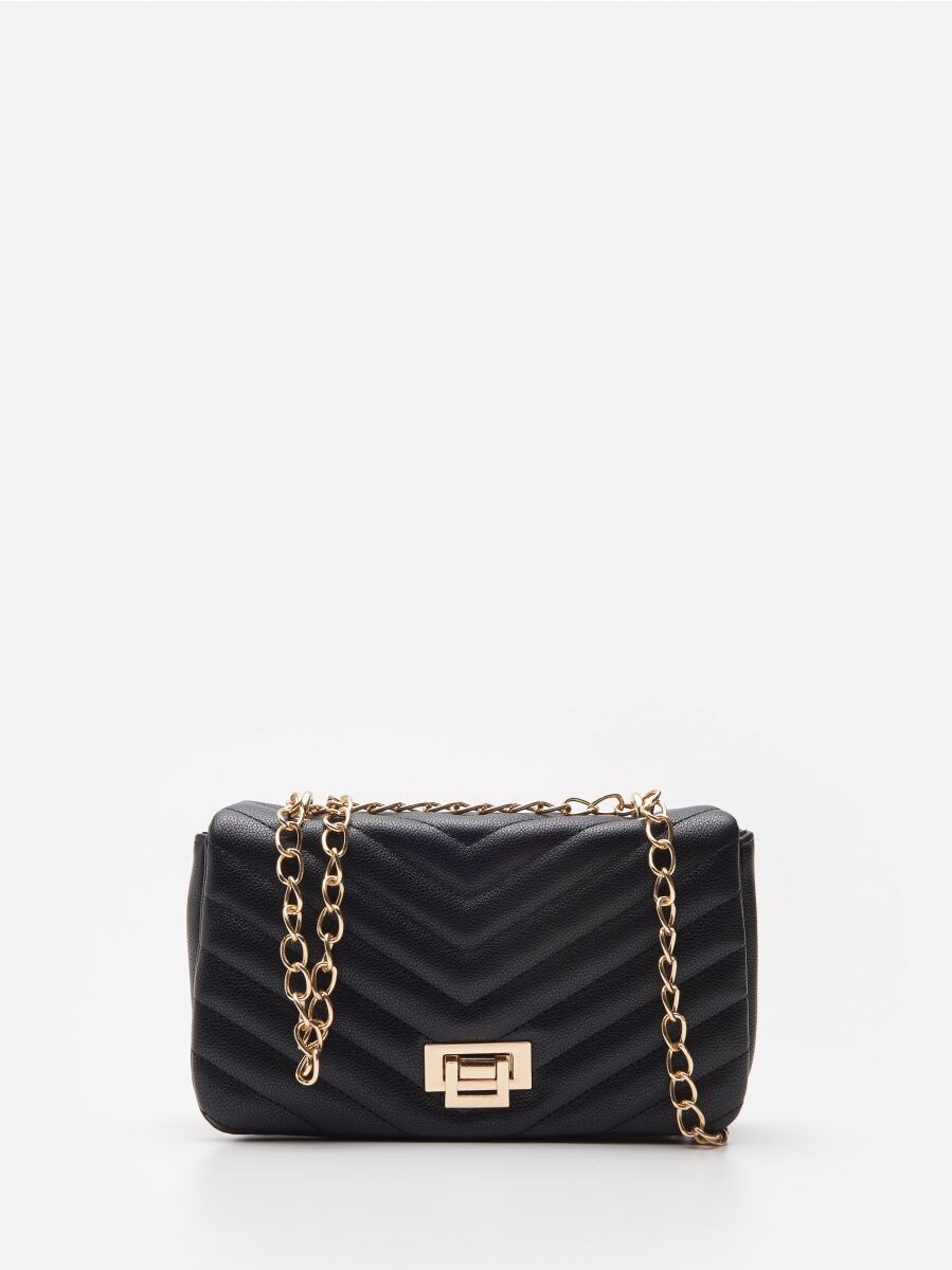 black quilted purse with chain strap