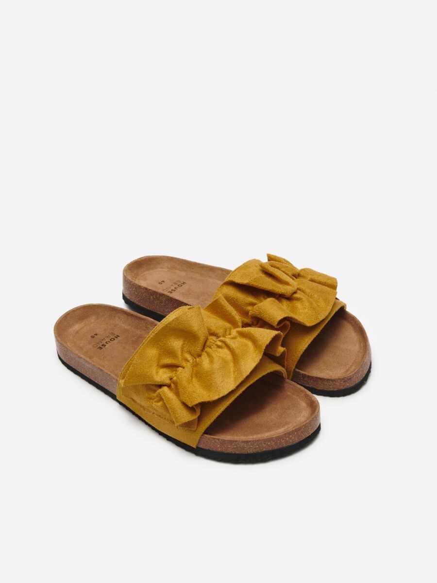 mustard yellow flip flops