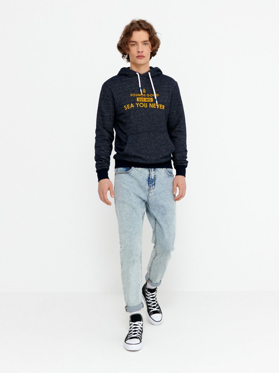 Carrot fit jeans with wash effect 