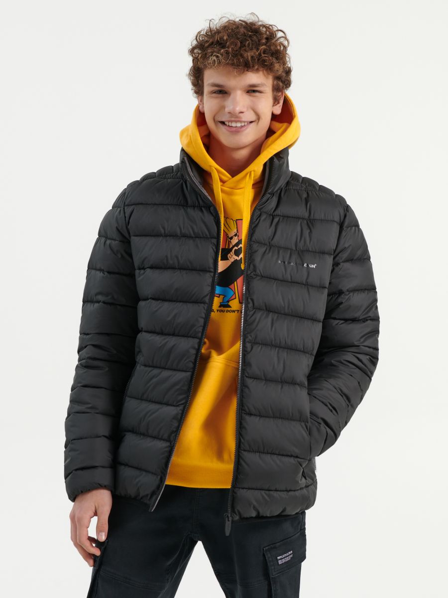 Quilted jacket with stand up collar 