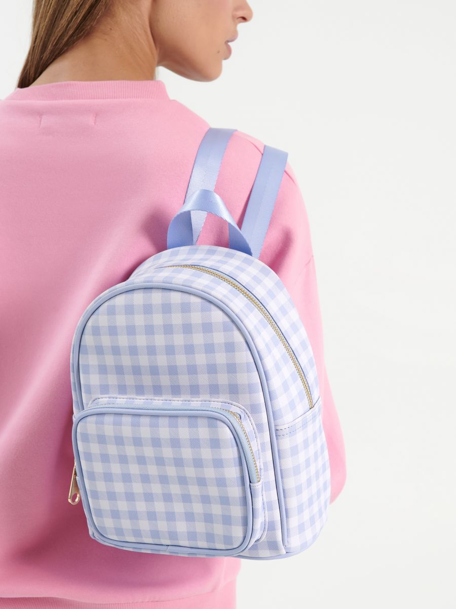 light blue pink backpack