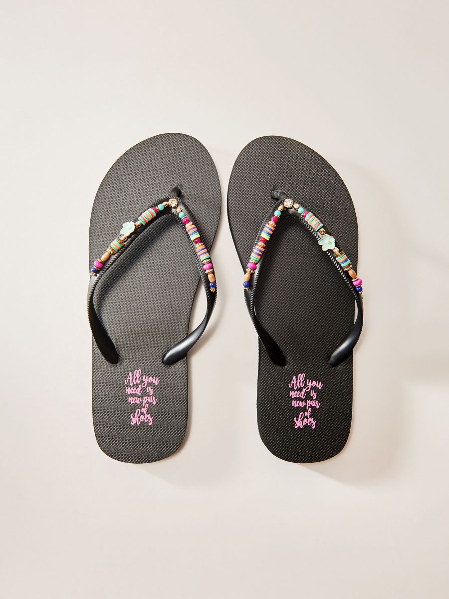 black beaded flip flops