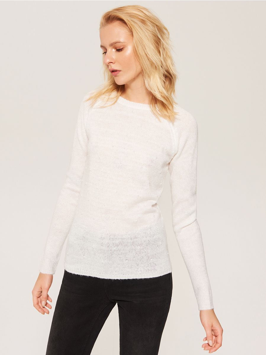 sweater with pearls on it