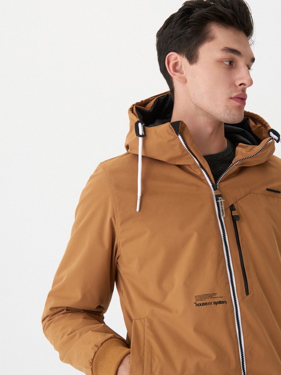 beige hooded jacket