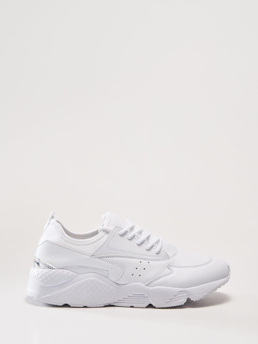 white thick sole trainers