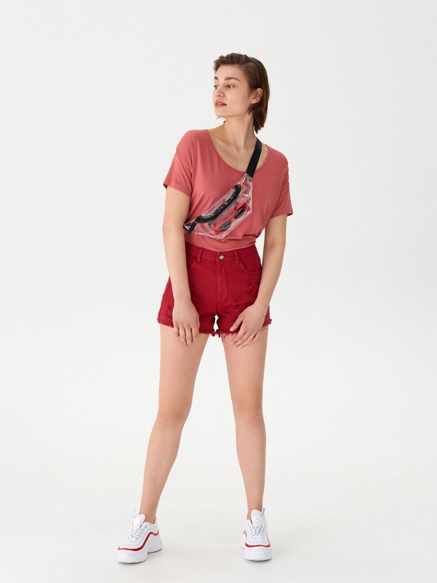 red distressed denim shorts