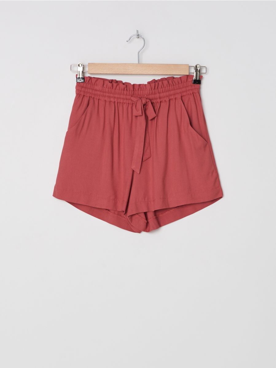 red paperbag waist shorts