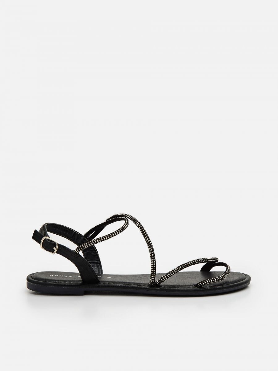 black strappy flip flops