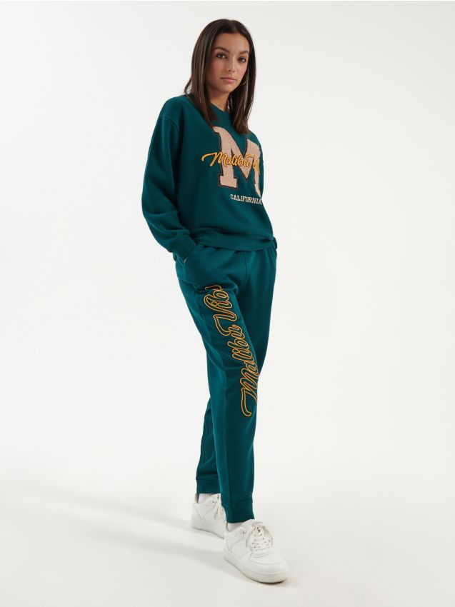Teplákové kalhoty joggers Malibu Vibes - teal green - HOUSE